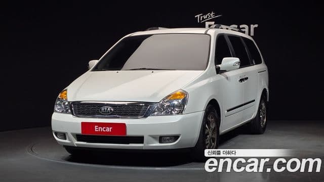 Kia Carnival R топовая версия, 2014 1