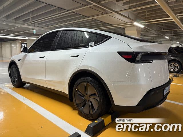 Tesla модель Y, 2025 4