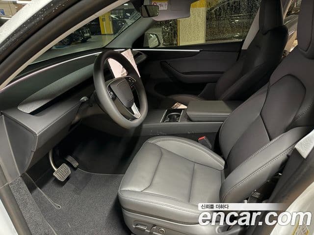 Tesla модель Y, 2025 12