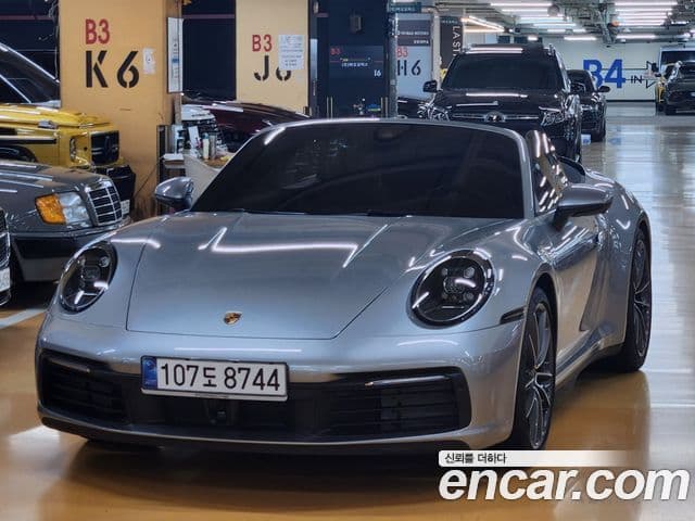 Porsche 911 (992) Carrera 4 кабриолет, 2024 1
