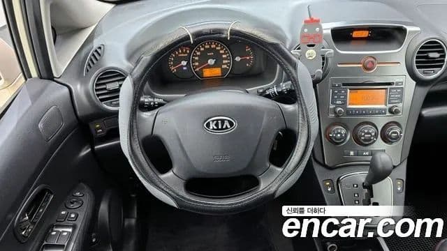 Kia 뉴카렌스 топовая версия, 2012 14