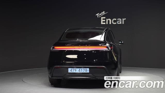 Tesla модель Y, 2025 4