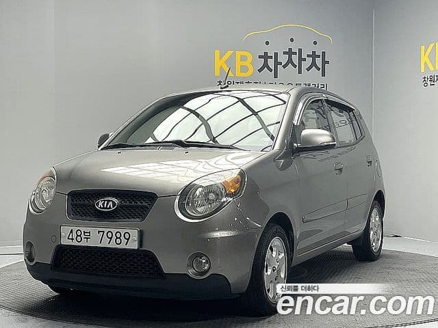 Kia 뉴모닝 люксовая версия Black Premium, 2011 1