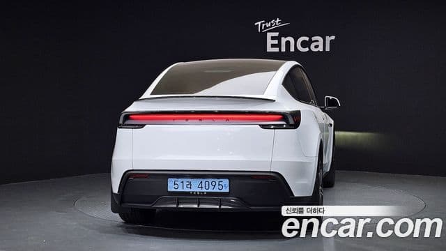 Tesla модель Y, 2025 4